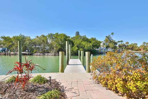 Luxury waterfront home with a heated pool and spa! - Image 1