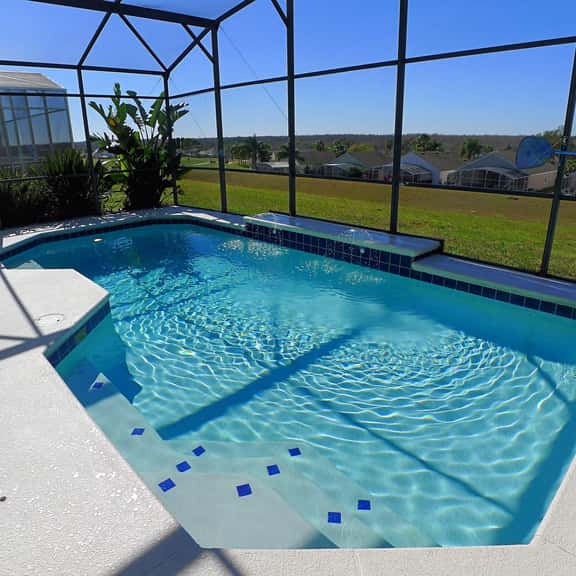Overlooking the golf course, spacious interior! - Image 1
