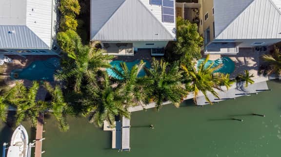 Luxury waterfront home with a heated pool and spa! - Image 2