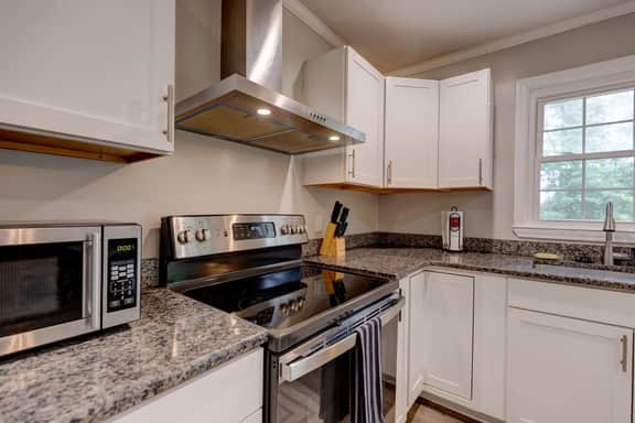Spacious 4BR/3BA Home with Large Fenced yard - Image 2