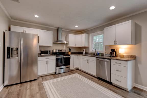Spacious 4BR/3BA Home with Large Fenced yard - Image 3