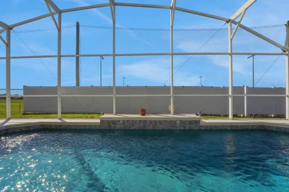 4BR West Haven Home with Heated Pool - Image 2